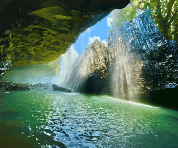Dray Nur Waterfall in Vietnam's Central Highlands, surrounded by lush nature.