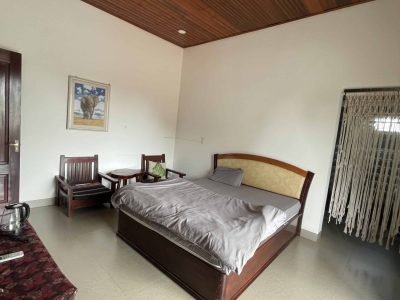 Eco-friendly homestay in Đắk Lắk with garden views, rustic rooms, and local farm experiences at Greentraveller.