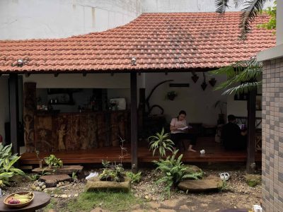 Eco-friendly homestay in Đắk Lắk with garden views, rustic rooms, and local farm experiences at Greentraveller.