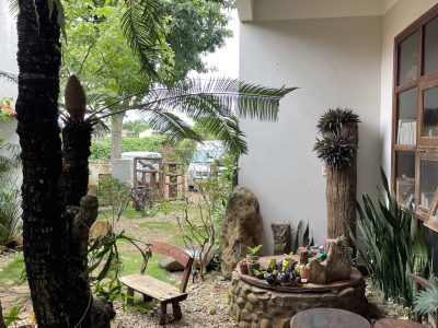 Eco-friendly homestay in Đắk Lắk with garden views, rustic rooms, and local farm experiences at Greentraveller.