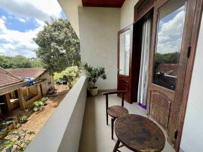 Eco-friendly homestay in Đắk Lắk with garden views, rustic rooms, and local farm experiences at Greentraveller.