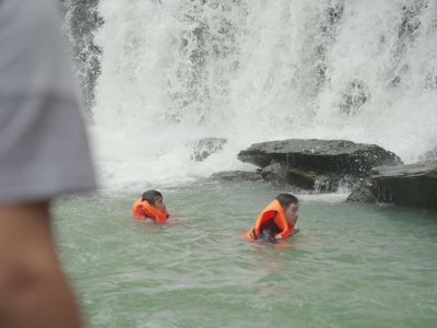 Dray Nur Waterfall adventure - biking, hiking, and rafting in Vietnam's Central Highlands.