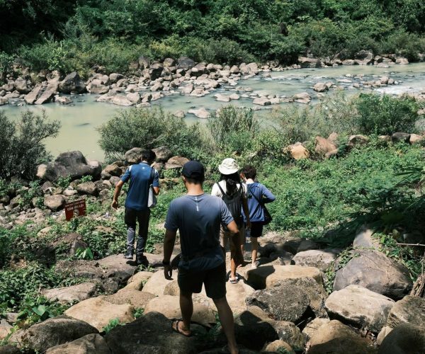 UNESCO Gong Heritage & Traditional Ede Cuisine Dray Nur Waterfall adventure - biking, hiking, and rafting in Vietnam's Central Highlands.