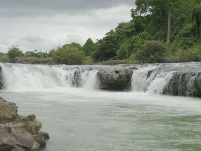 Dray Nur Waterfall adventure - biking, hiking, and rafting in Vietnam's Central Highlands.