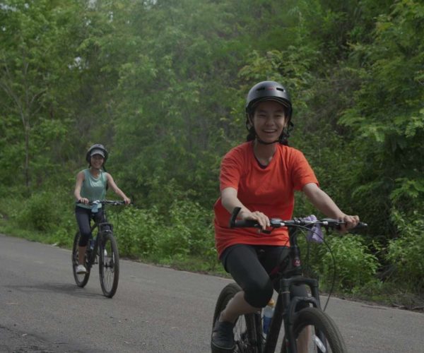 UNESCO Gong Heritage & Traditional Ede Cuisine Dray Nur Waterfall adventure - biking, hiking, and rafting in Vietnam's Central Highlands.