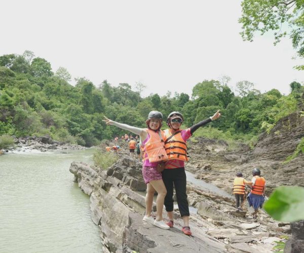 UNESCO Gong Heritage & Traditional Ede Cuisine Dray Nur Waterfall adventure - biking, hiking, and rafting in Vietnam's Central Highlands.
