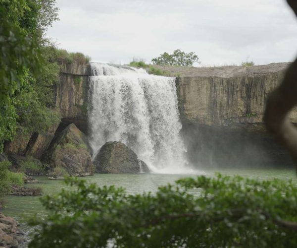 UNESCO Gong Heritage & Traditional Ede Cuisine Dray Nur Waterfall adventure - biking, hiking, and rafting in Vietnam's Central Highlands.
