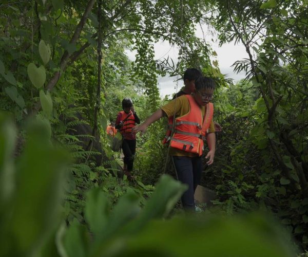 UNESCO Gong Heritage & Traditional Ede Cuisine Dray Nur Waterfall adventure - biking, hiking, and rafting in Vietnam's Central Highlands.