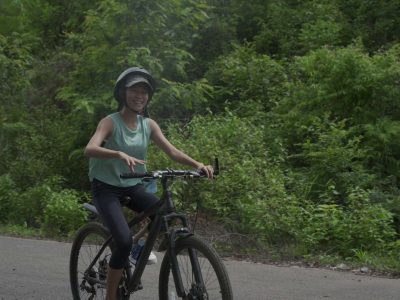 Dray Nur Waterfall adventure - biking, hiking, and rafting in Vietnam's Central Highlands.